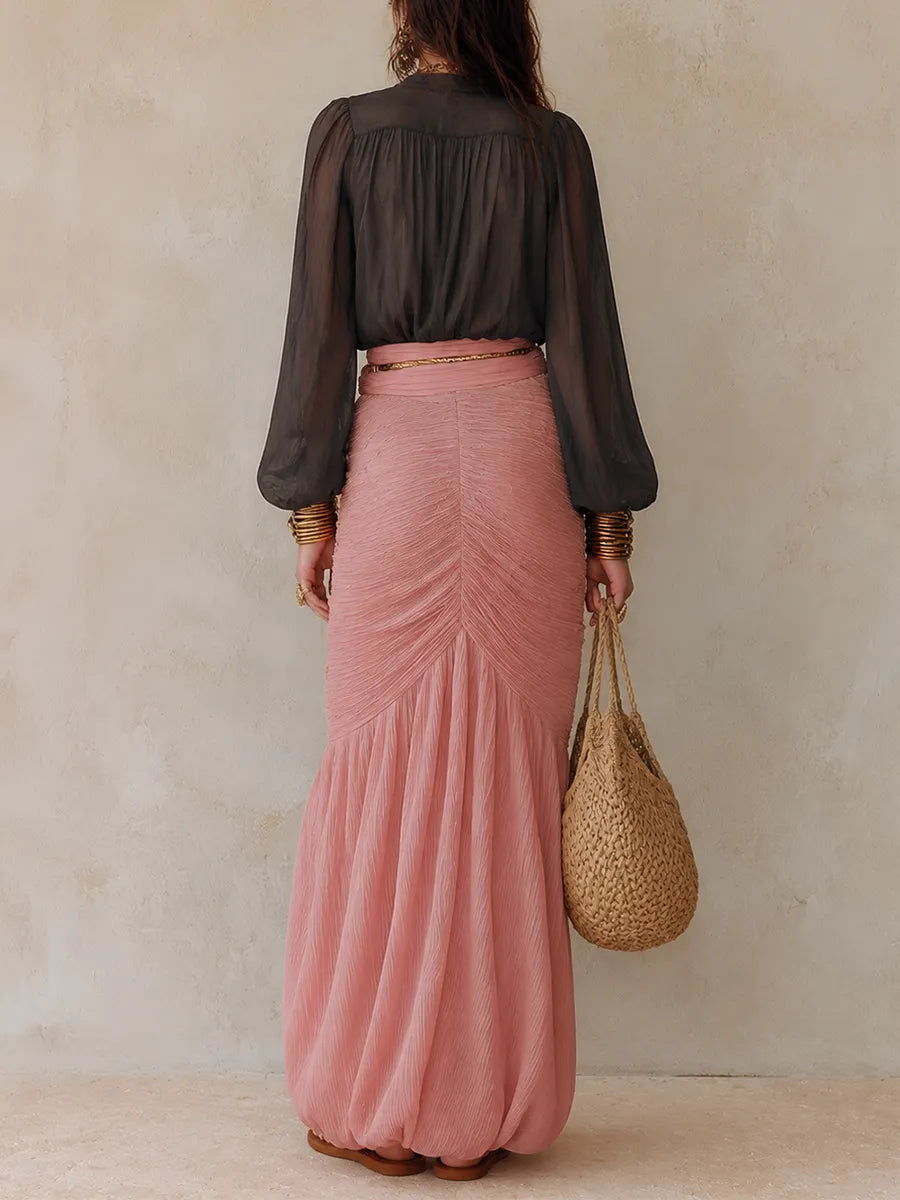 Boho Luxe Ensemble A Sheer, Deep-V Top Paired With A Flowy Pink Maxi Skirt