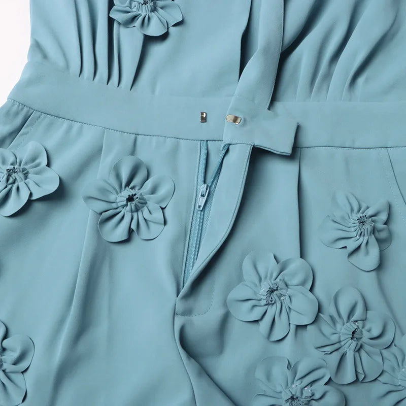 Turquoise Jumpsuit with 3D Floral Appliqués, Long Sleeves & Shorts