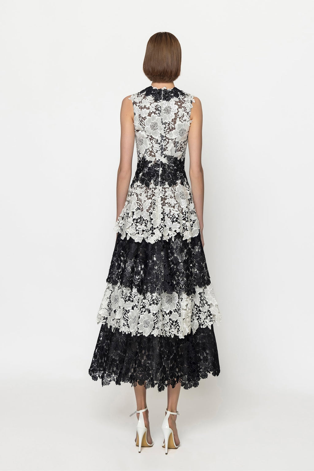 Sleeveless guipure dress with tiered skirt