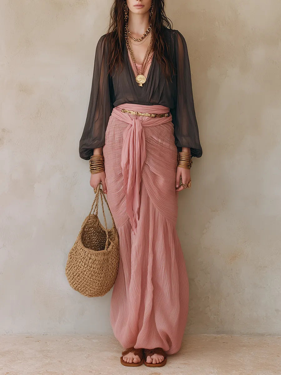 Boho Luxe Ensemble A Sheer, Deep-V Top Paired With A Flowy Pink Maxi Skirt
