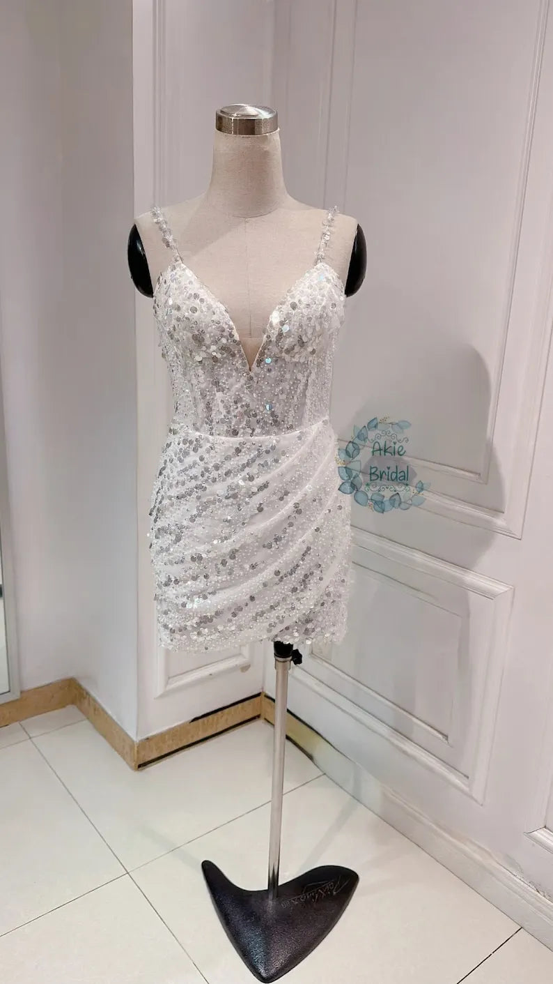 Custom wedding dress for the bride. Sexy V-deep short wedding dress. Beaded mini wedding dress with spaghetti sleeves for the party.