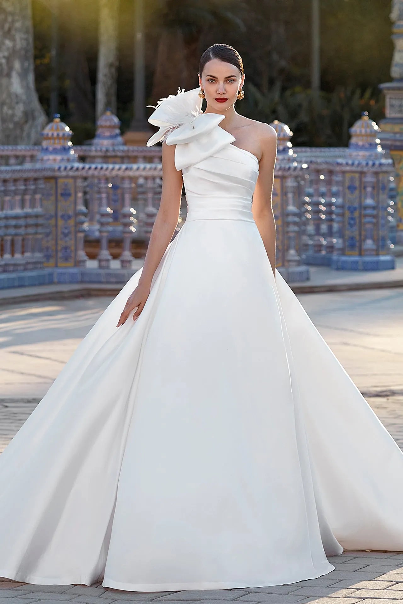 Asymmetrical neckline sleeveless wedding gown