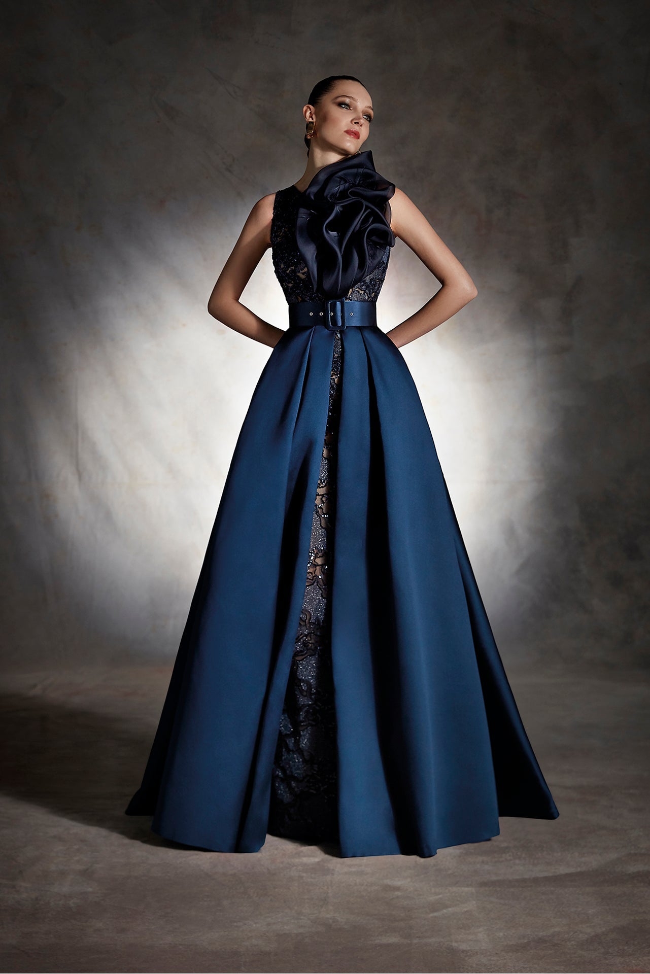 Lace dress paired with detachable overskirt
