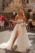 Elegant Off-the-Shoulder Tulle Mermaid Wedding Dress With Lace Appliques