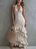 Elegant Textured Halter Neck Ruffle Hem Maxi Dress