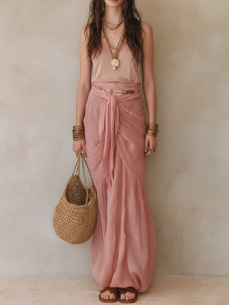 Boho Luxe Ensemble A Sheer, Deep-V Top Paired With A Flowy Pink Maxi Skirt