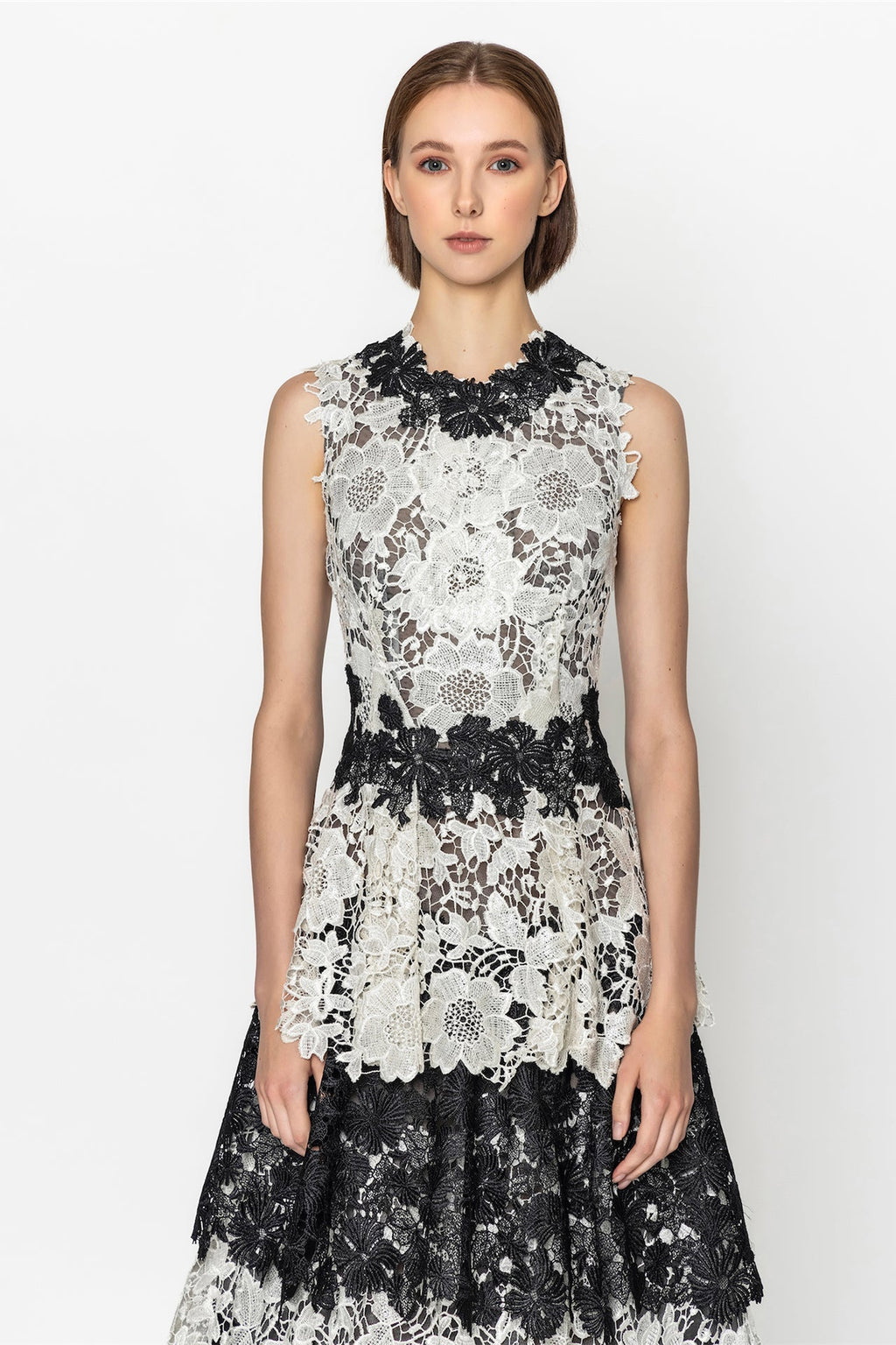 Sleeveless guipure dress with tiered skirt