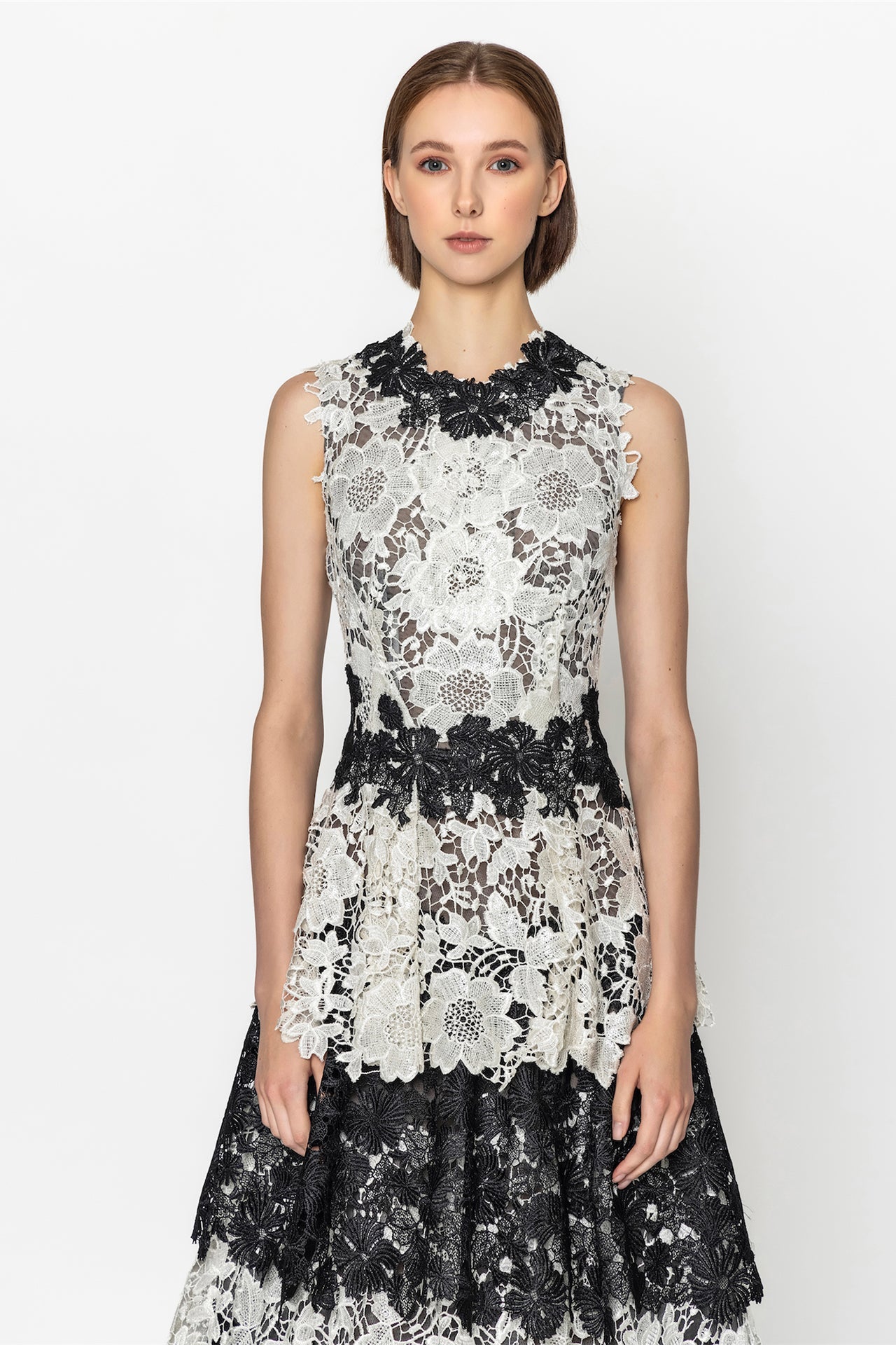 Sleeveless guipure dress with tiered skirt